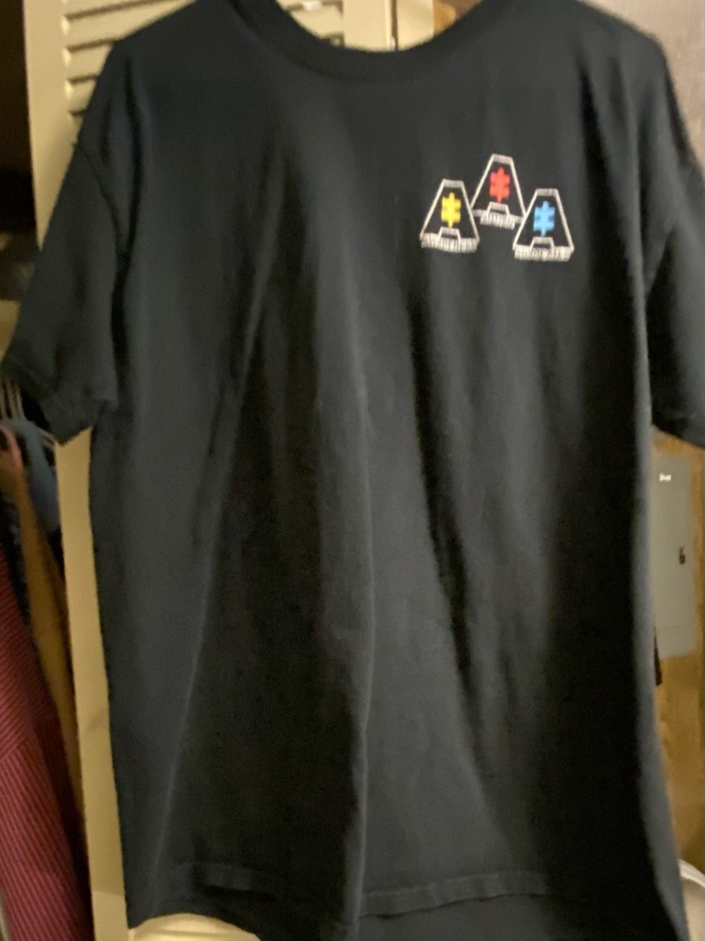 Gildan Black Short Sleeve Crewneck Tee with Small Multicolor Chest Graphic